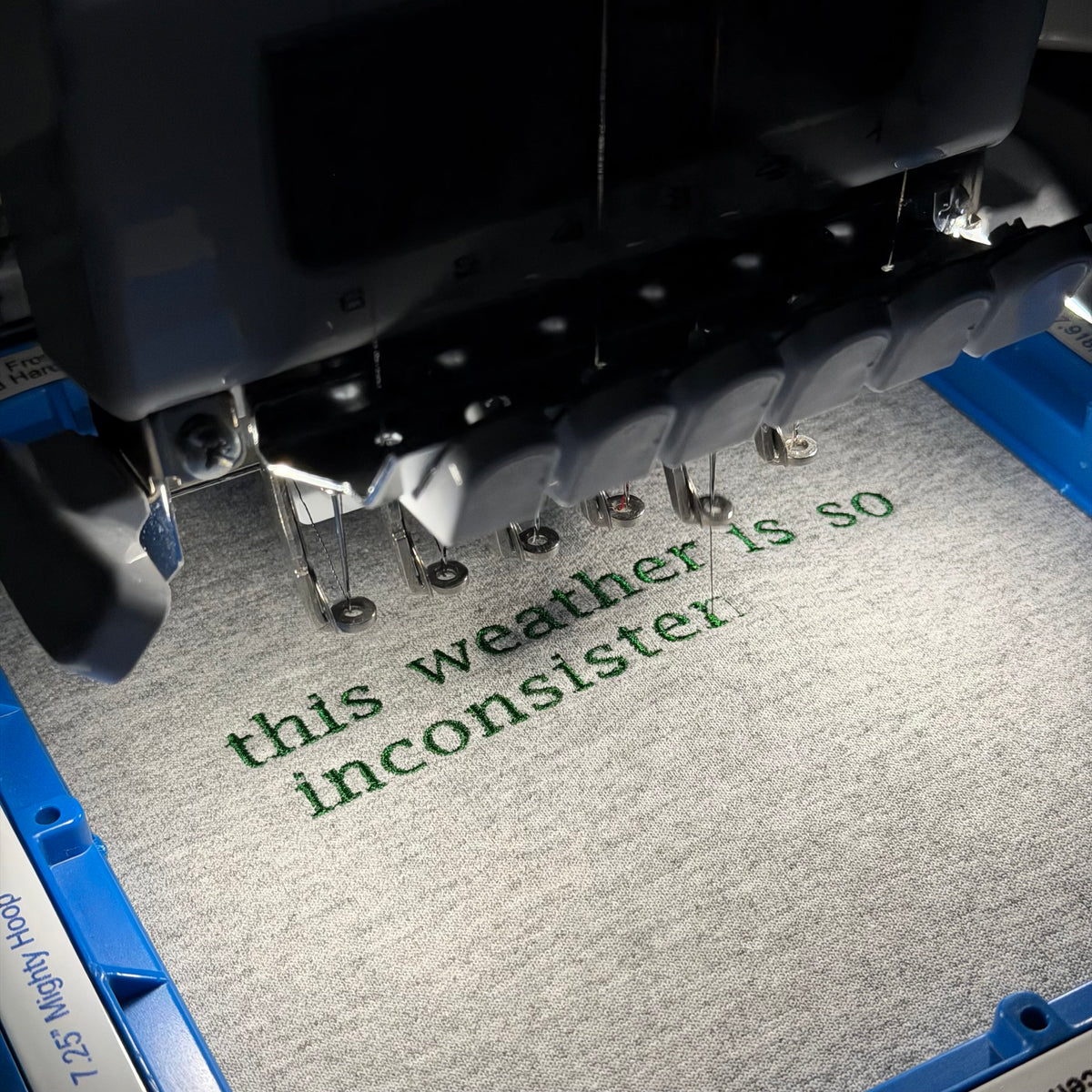 “This weather is so inconsistent, it’s giving men” embroidered sweatshirt
