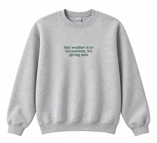 “This weather is so inconsistent, it’s giving men” embroidered sweatshirt